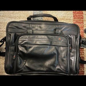 Fine leather computer/travel case. Great condition. Barely used once.